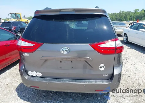 2015 Toyota Sienna Xle Premium 8 Passenger z USA, uszkodzony, nr VIN 5TDYK3DC2FS659691